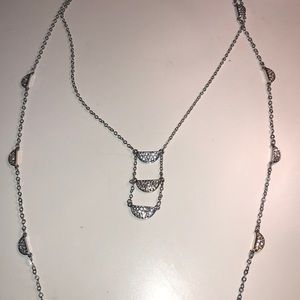 layered gold and silver necklace